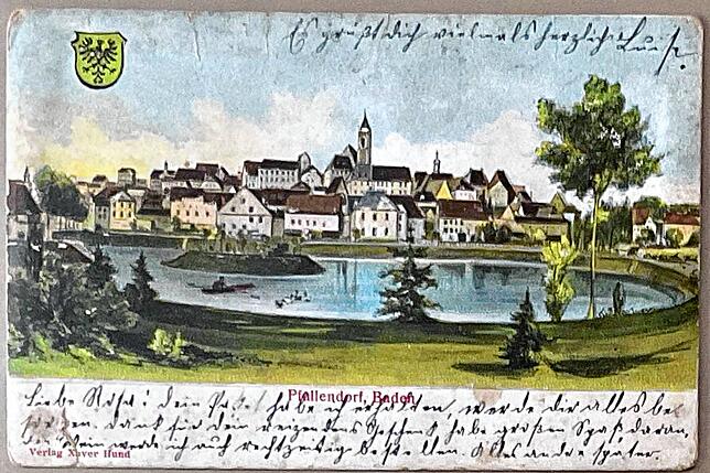 Eine alte Postkarte zeigt den Stadtsee mit Ruderboot.