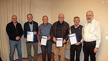 Ehrungen bei der Stadtkapelle (von links): Vorsitzender Ulrich Bäumler, Julius Moser (60 Jahre Mitglied), Heiner Stumpp (70 Jahre), Gerd ...