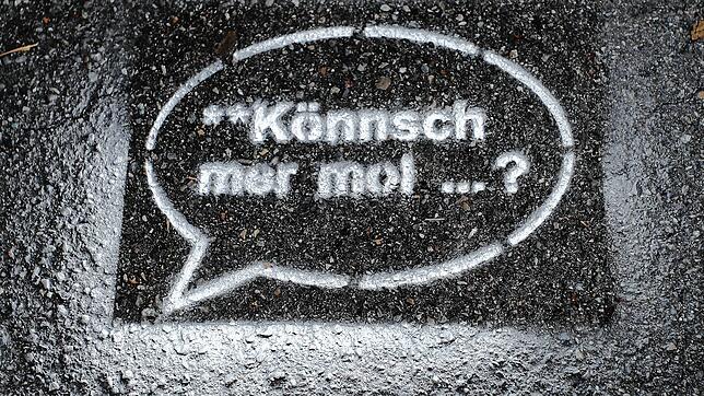 Mit den Sprechblasen &bdquo;Könnsch mer mol...&ldquo; und &bdquo;Solle mer zamme...?&ldquo; wollten die Aktivisten Nachbarschaftspflege ...
