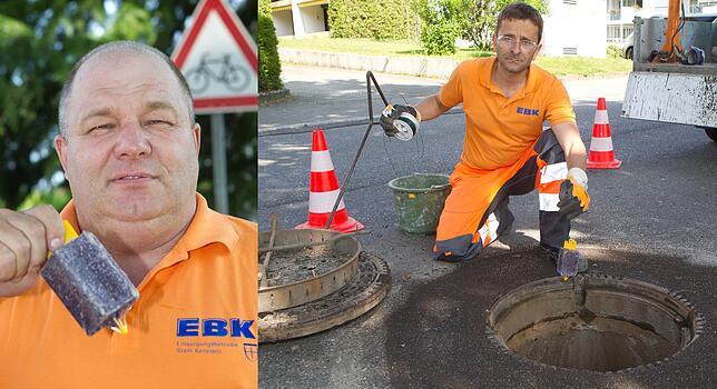 Rattenjäger im Einsatz: Uwe Giermann (links) und Oliver Kratzer bringen in einem Kanalschacht in Litzelstetten einen Köder an.