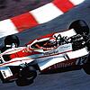 Rennfahrer Clay Regazzoni sitzt am Steuer eines Formel-1-Wagens mit Villiger-Werbeaufschrift. Ab 1976 war das Tabakunternehmen, das von ...