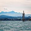Der Leuchtturm im Bodensee, im Hintergrund der Säntis.