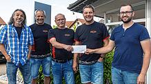 Spende für die Ukraine (von links): Ralf Rosa, Christoph Booz, Harald Morath und Edgar Kaiser übergeben einen Scheck über 1300&nbsp; ...