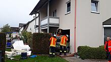 Blick von Außen auf das Wohnzimmer im Erdgeschoss.