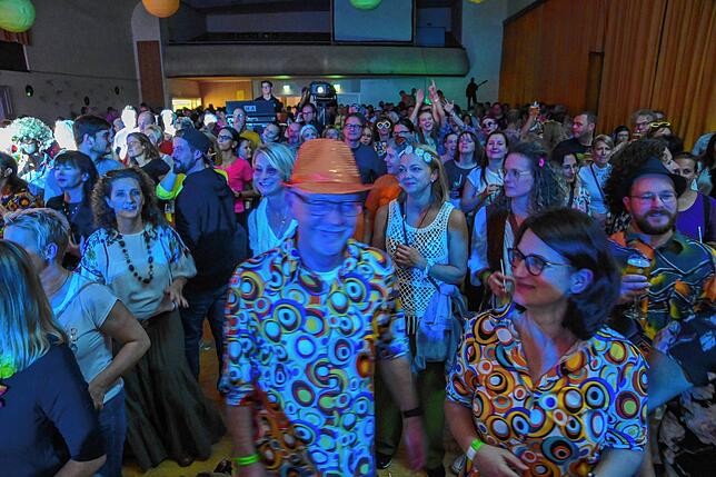 Bild 12: Papi's Pumpels: schrille Party im 70er Jahre-Look