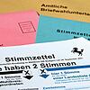 Wählen aus der Schweiz? Für Tausende frühere Baden-Württemberger (hier ein Bild der Briefwahlunterlagen des Wahlkreises Stuttgart) ist ...