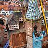 In luftiger Höhe im Südturm verrichten die Handwerker ihre schwierige Arbeit: Sie müssen die tonnenschwere Glocke ausbauen.