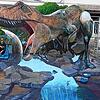 Das Maul hungrig aufgerissen schnappt der Tyrannosaurus Rex auf dem Blumberger Marktplatz 2021 nach Arina Arndt. Sie ist die Frau des ...