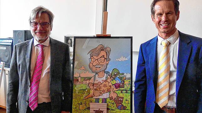 Der alte und der neue Leiter des SSA, Gernot Schultheiß (links) mit einem treffenden Portrait, erstellt durch seinen Mitarbeiterstab, ...