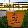 Das Gebäude des Landtags in Stuttgart ist in den frühen Morgenstunden hell beleuchtet. Eine Petition möchte verhindern, dass die Zahl ...