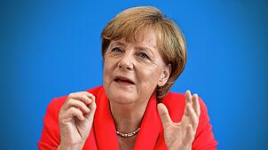 Die damalige Bundeskanzlerin Angela Merkel am 31. August 2015 in der traditionellen Sommer-Pressekonferenz in Berlin. Bei dieser ...