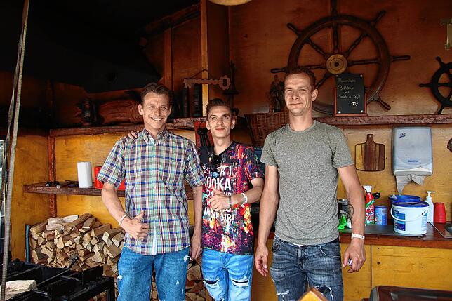 Die drei Brüder William, Jean-René und Luke Bossle arbeiten im Flammlachsstand. Sie kämen immer wieder gerne auf das Southside, sagen sie.