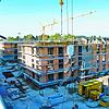 Blick von der Dachterrasse des Hauses 1 auf die Häuser 3 und 4. Bei den beiden Häusern ist der Rohbau fast fertig abgeschlossen und ...
