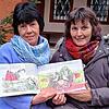 Kinderbuchautorin Maria Simon (links) und ihre Freundin, Kunstmalerin Sandra Friedrich, freuen sich über ihr Kinderbuch „Alma, das ...