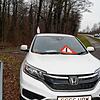 Kaputte Rückscheibe, Chaos im Fahrzeuginnern: Der weiße Honda mit britischem Kennzeichen an der Landesstraße&nbsp;201 zwischen Salem und ...