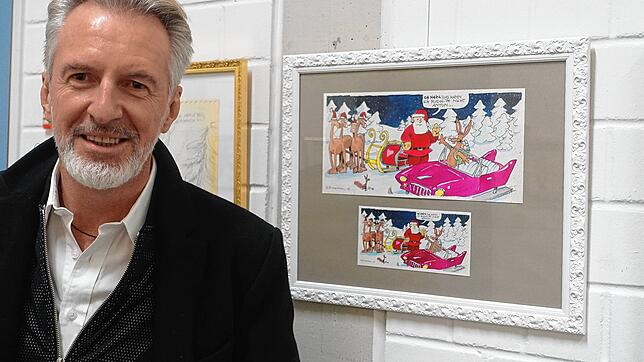 Malermeister Thomas Lindenthal zeigt in der VHS seine humorvollen Weihnachtscomics.