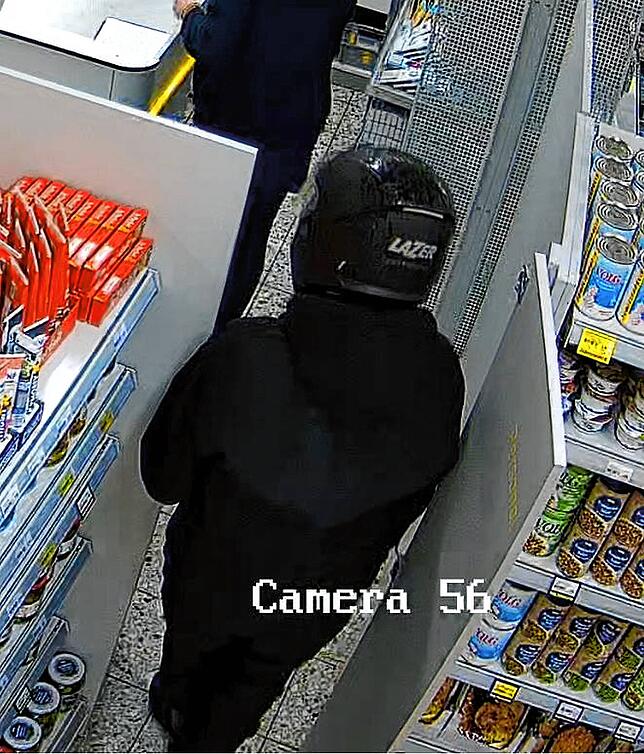 Bild 1: Bewaffneter Mann überfällt Lebensmittelgeschäft! Wer hat ihn gesehen?