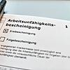 Die Arbeitsunfähigkeitsbescheinigung des Südkurier Hochrheinreporters Nico Talenta: Auch er lag mit Fieber eine Woche krank zu Hause.