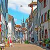 Blick in eine Gasse in der Altstadt von Basel: Hier gibt es viele kleine Geschäfte und Boutiquen. Auch der Handel in Basel freut sich ...