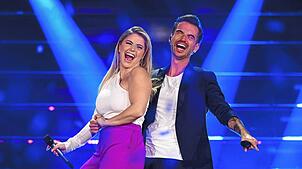 Beatrice Egli und Florian Silbereisen glänzen gemeinsam auf der Bühne.