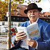 Wolfgang Müller-Fehrenbach hat seine Gedichte in einem Buch zusammengefasst. Das Konzil ziert die Vorderseite, im Hintergrund ist es in ...