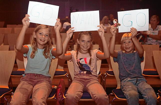 „Go, Mami, go!“ Grace, Elaine und Gabriel fiebern mit ihrer Mutter Oksana mit.