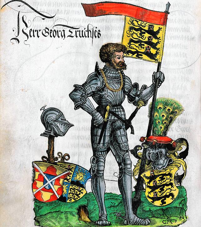 Truchsess Georg III. von Waldburg-Zei auf einem kolorierten Holzschnitt von 1530. In seinem Wappen trägt er die drei Staufer-Löwen, die ...