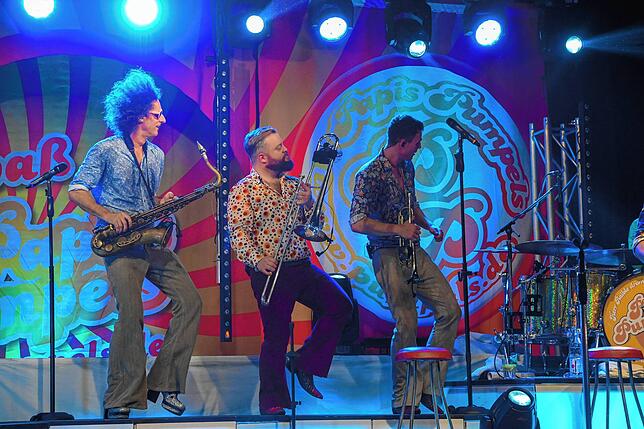 Bild 15: Papi's Pumpels: schrille Party im 70er Jahre-Look