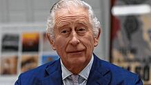 Britain&lsquo;s King Charles III reacts during a roundtable as part of his visit of the Africa Centre, in Southwark, Greater London, on ...
