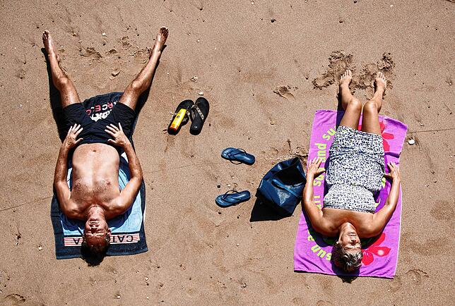 Unverzichtbare Begleiter auch am Strand: Flip-Flops.