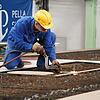 Schiffsbau ist Heavy Metal: Ein Mitarbeiter der Pella Sietas Werft in Hamburg arbeitet am ersten Bauteil für die neue Fähre auf der ...