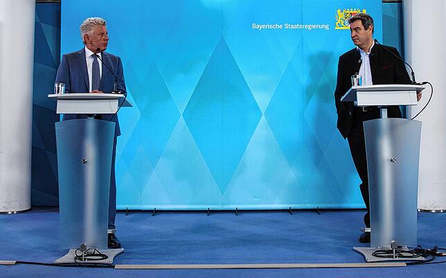 Markus Söder (r, CSU), Ministerpräsident von Bayern, und Dieter Reiter (SPD), Oberbürgermeister von München, verkünden das Aus für das ...