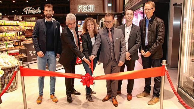 Der neue Schmidts Markt XL ist eröffnet (von links) Paul Barkhoff von der Firma Lidl, Bürgermeister Michael Thater, ...