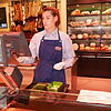 Corinna Schüele, in Ausbildung zur Kauffrau im Einzelhandel bei Schmidts Markt in Bad Säckingen, wiegt Wurst ab, die sie gerade in das ...