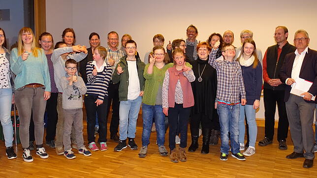 Am Rande der Podiumsveranstaltung bekunden etliche Familien und Referenten: Sie finden das Leben cool – egal ob mit oder ohne Downsyndrom.