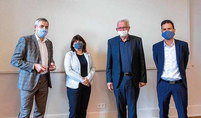 Peter Reinhardt, Ulrike Bäuerlein, Winfried Kretschmann und Michael Schwarz.