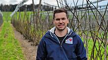 Christian Büchele vor seinen Feigenpflanzen. 2019 fing er an, diese anzubauen und war Teil eines Versuchs des Kompetenzzentrums ...